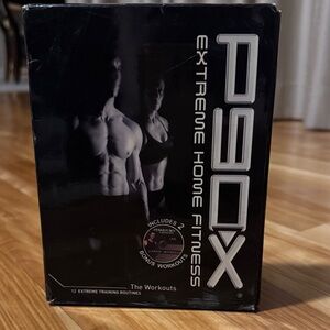 P90X Extrme Hone Fitness DVD set includes 12 dvd workouts